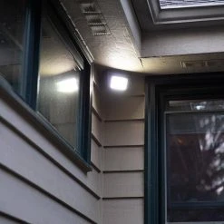 Integrated LED Black Motion-Sensing Compact Standard Light by Westek -Outlet OttLite Store black westek wall pack lights bl smsl 66 1000