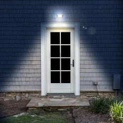 Integrated LED Black Motion-Sensing Compact Standard Light by Westek -Outlet OttLite Store black westek wall pack lights bl smsl 77 1000